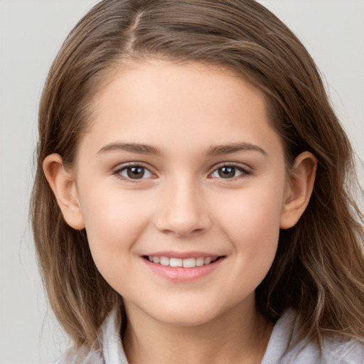 Joyful white child female with medium  brown hair and brown eyes