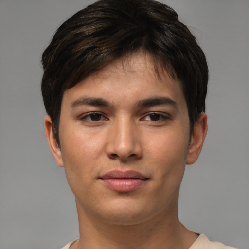 Joyful asian young-adult male with short  brown hair and brown eyes