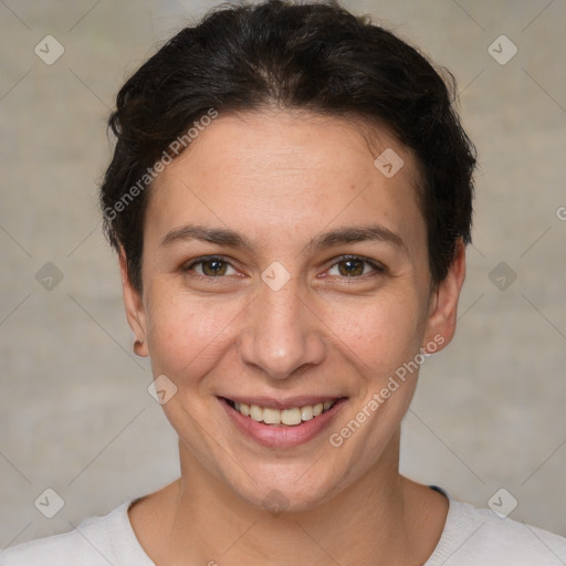 Joyful white adult female with short  brown hair and brown eyes