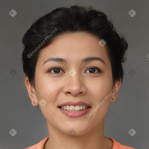 Joyful latino young-adult female with short  brown hair and brown eyes