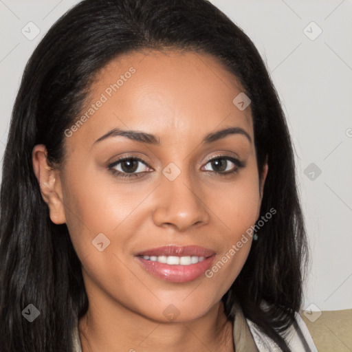 Joyful latino young-adult female with long  brown hair and brown eyes