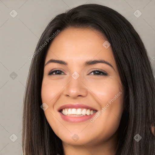 Joyful white young-adult female with long  black hair and brown eyes