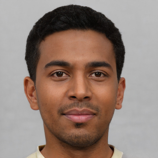 Neutral latino young-adult male with short  black hair and brown eyes