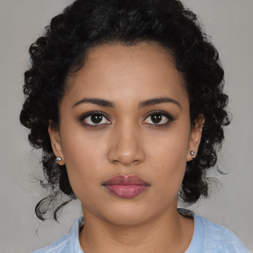 Neutral latino young-adult female with medium  black hair and brown eyes