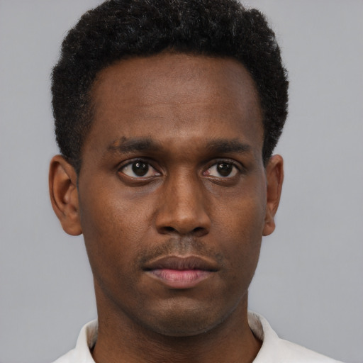 Neutral black young-adult male with short  brown hair and brown eyes