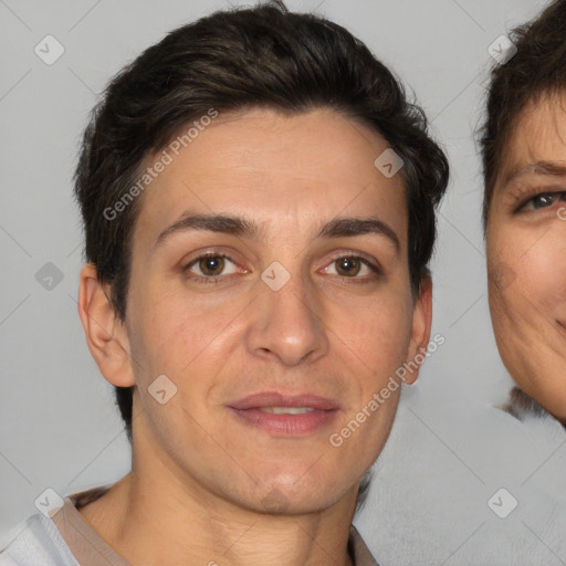 Joyful white adult male with short  brown hair and brown eyes