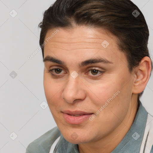 Joyful white adult female with short  brown hair and brown eyes