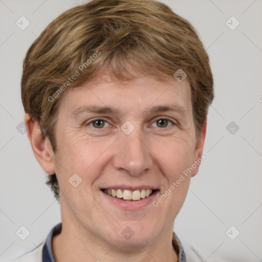 Joyful white adult female with short  brown hair and grey eyes