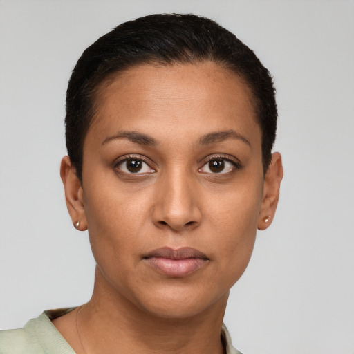 Neutral latino young-adult female with short  brown hair and brown eyes