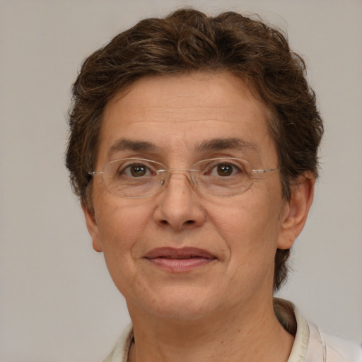 Joyful white middle-aged female with short  brown hair and brown eyes