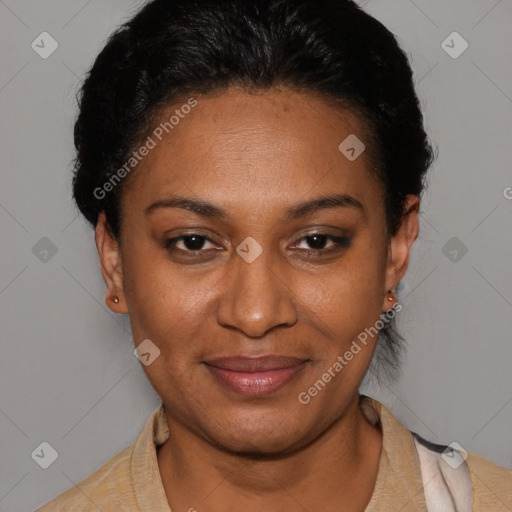 Joyful black adult female with short  black hair and brown eyes