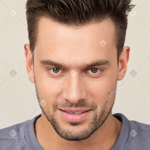 Joyful white young-adult male with short  brown hair and brown eyes