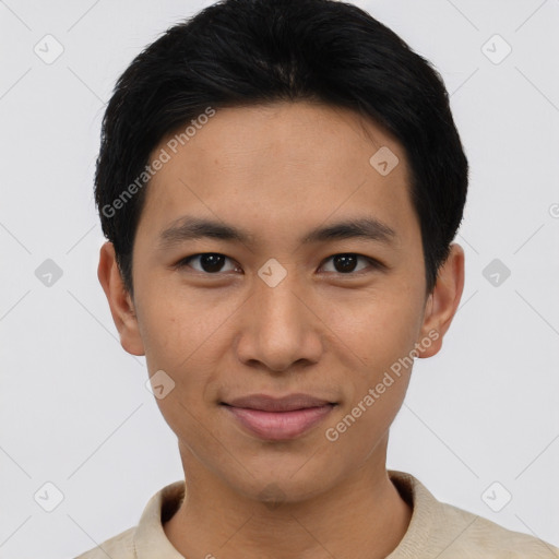 Joyful asian young-adult male with short  black hair and brown eyes