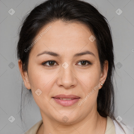 Joyful white adult female with medium  brown hair and brown eyes