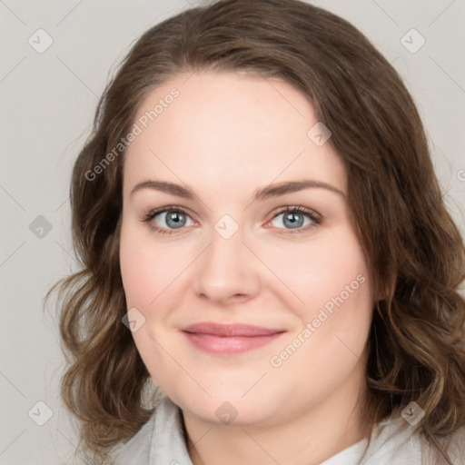 Joyful white young-adult female with medium  brown hair and green eyes