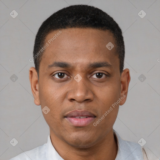 Joyful latino young-adult male with short  brown hair and brown eyes