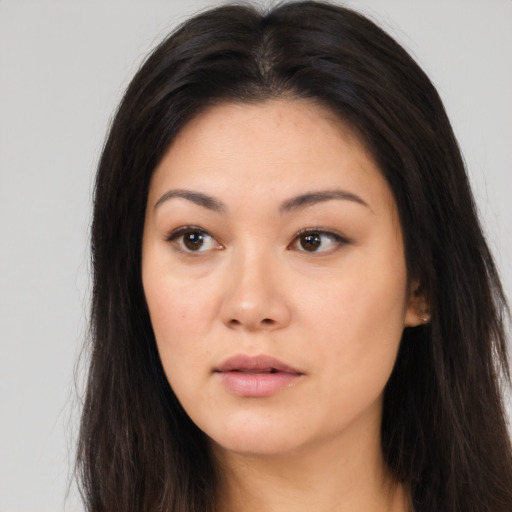 Neutral asian young-adult female with long  brown hair and brown eyes