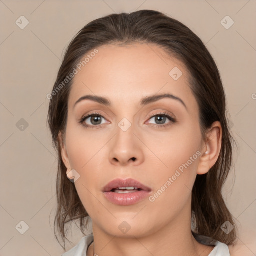 Neutral white young-adult female with medium  brown hair and brown eyes