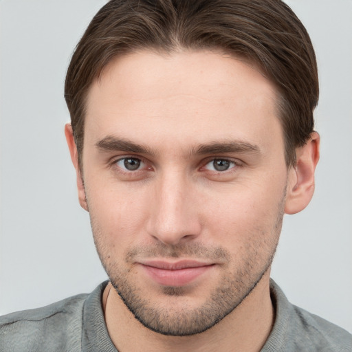 Neutral white young-adult male with short  brown hair and grey eyes