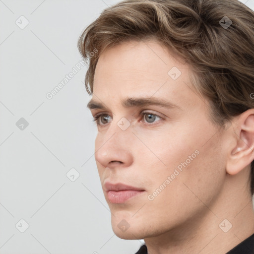 Neutral white young-adult male with short  brown hair and grey eyes