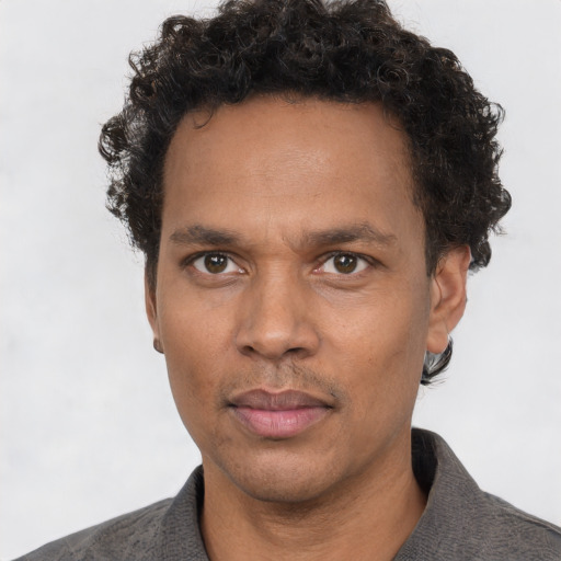 Neutral white adult male with short  brown hair and brown eyes