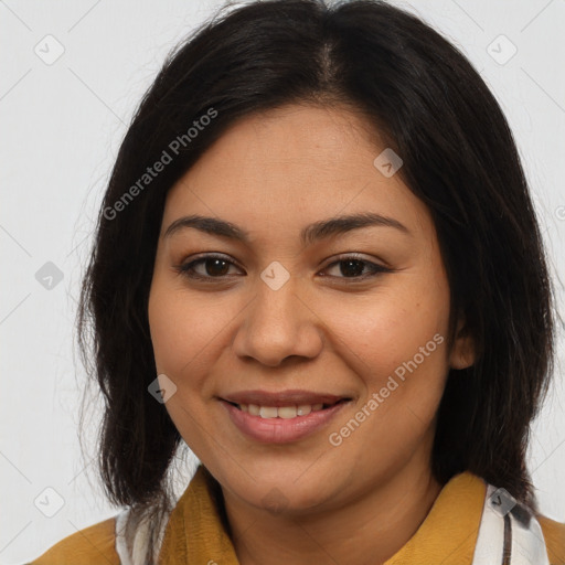 Joyful latino young-adult female with medium  brown hair and brown eyes