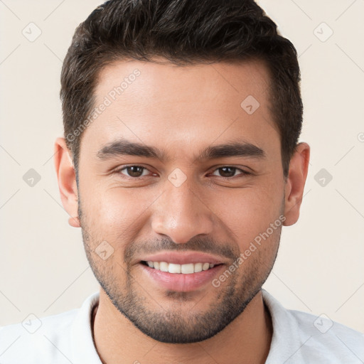 Joyful white young-adult male with short  brown hair and brown eyes