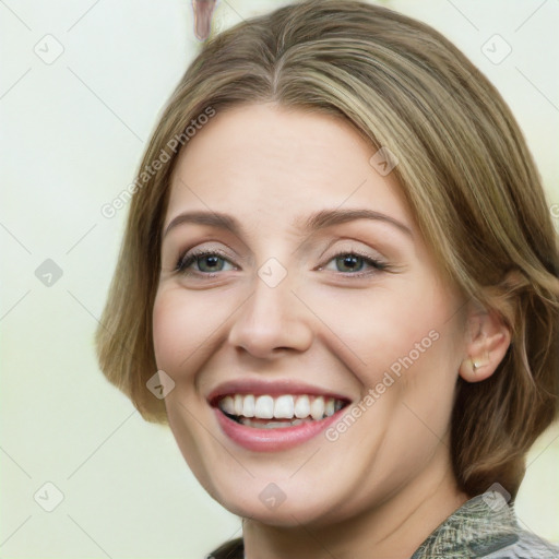 Joyful white young-adult female with medium  brown hair and green eyes