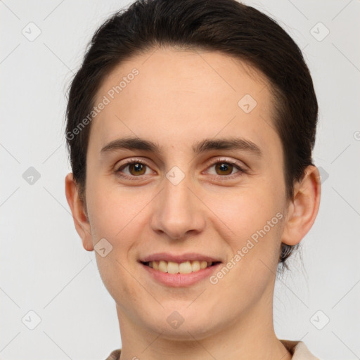 Joyful white young-adult female with short  brown hair and brown eyes