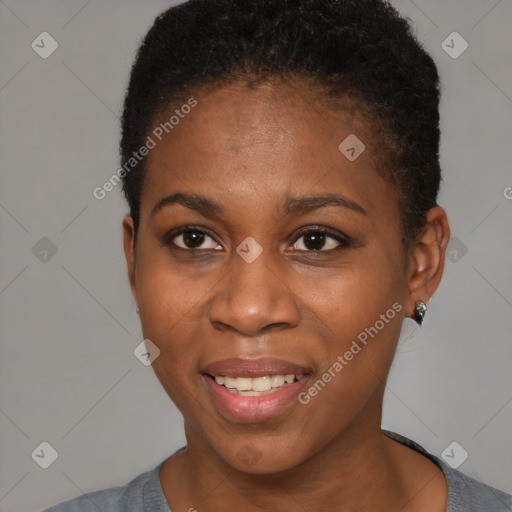 Joyful black young-adult female with short  brown hair and brown eyes