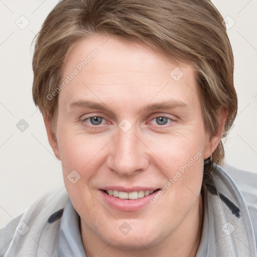 Joyful white young-adult female with medium  brown hair and blue eyes