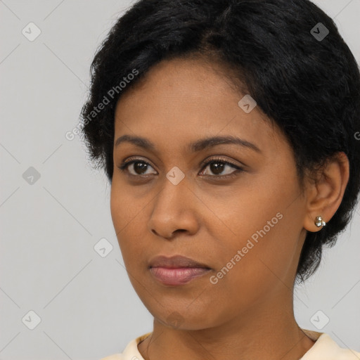 Neutral black young-adult female with short  black hair and brown eyes