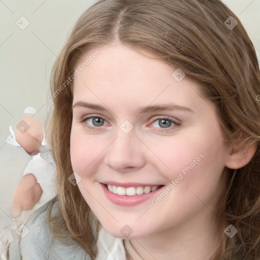 Joyful white young-adult female with medium  brown hair and grey eyes