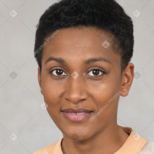 Joyful black young-adult female with short  brown hair and brown eyes