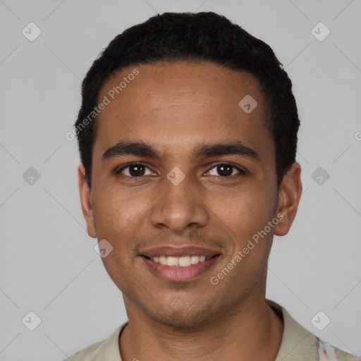 Joyful black young-adult male with short  black hair and brown eyes