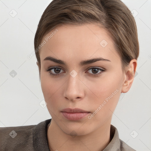 Neutral white young-adult female with short  brown hair and brown eyes