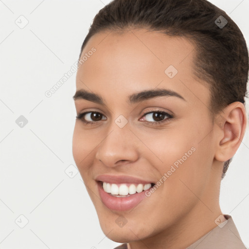 Joyful white young-adult female with short  brown hair and brown eyes