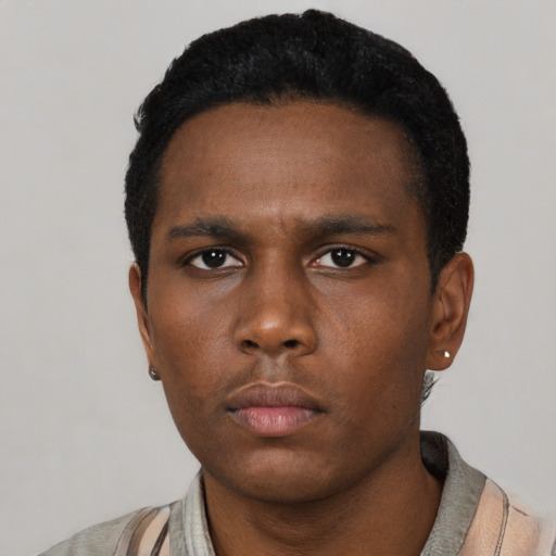 Neutral black young-adult male with short  black hair and brown eyes