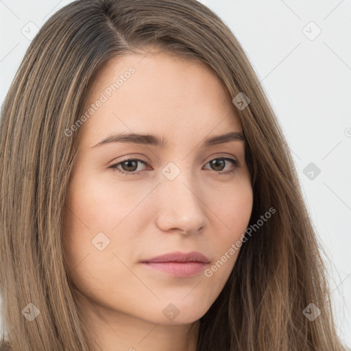 Neutral white young-adult female with long  brown hair and brown eyes