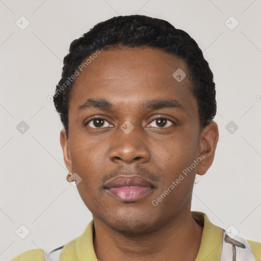 Neutral black young-adult male with short  black hair and brown eyes