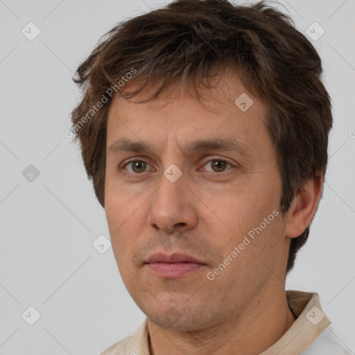 Neutral white adult male with short  brown hair and brown eyes