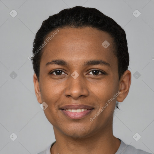 Joyful black young-adult male with short  black hair and brown eyes