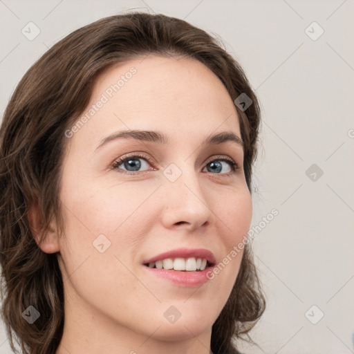 Joyful white young-adult female with medium  brown hair and green eyes