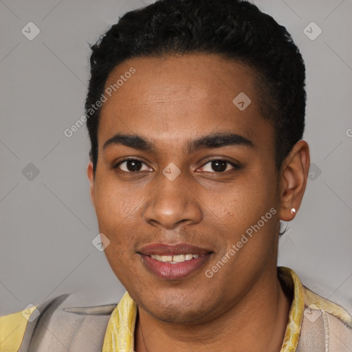 Joyful black young-adult male with short  black hair and brown eyes