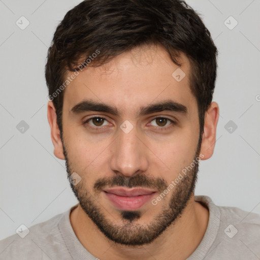 Neutral white young-adult male with short  brown hair and brown eyes