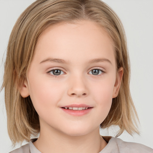 Joyful white child female with medium  brown hair and grey eyes