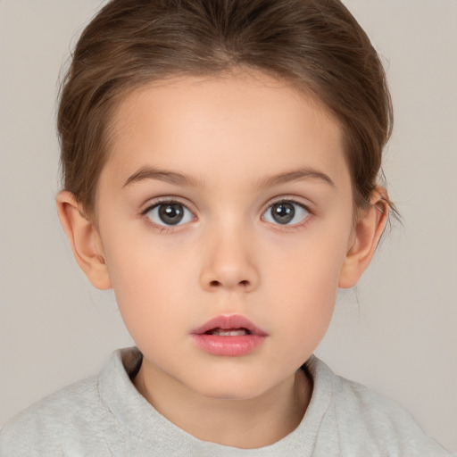 Neutral white child female with medium  brown hair and brown eyes