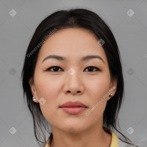 Joyful asian young-adult female with medium  brown hair and brown eyes