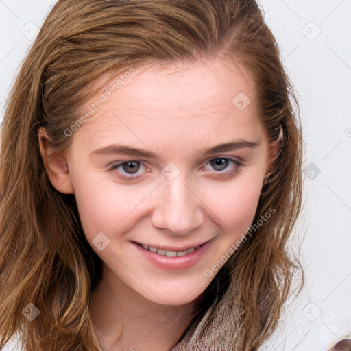 Joyful white young-adult female with long  brown hair and blue eyes