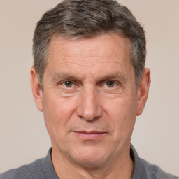 Joyful white middle-aged male with short  brown hair and brown eyes